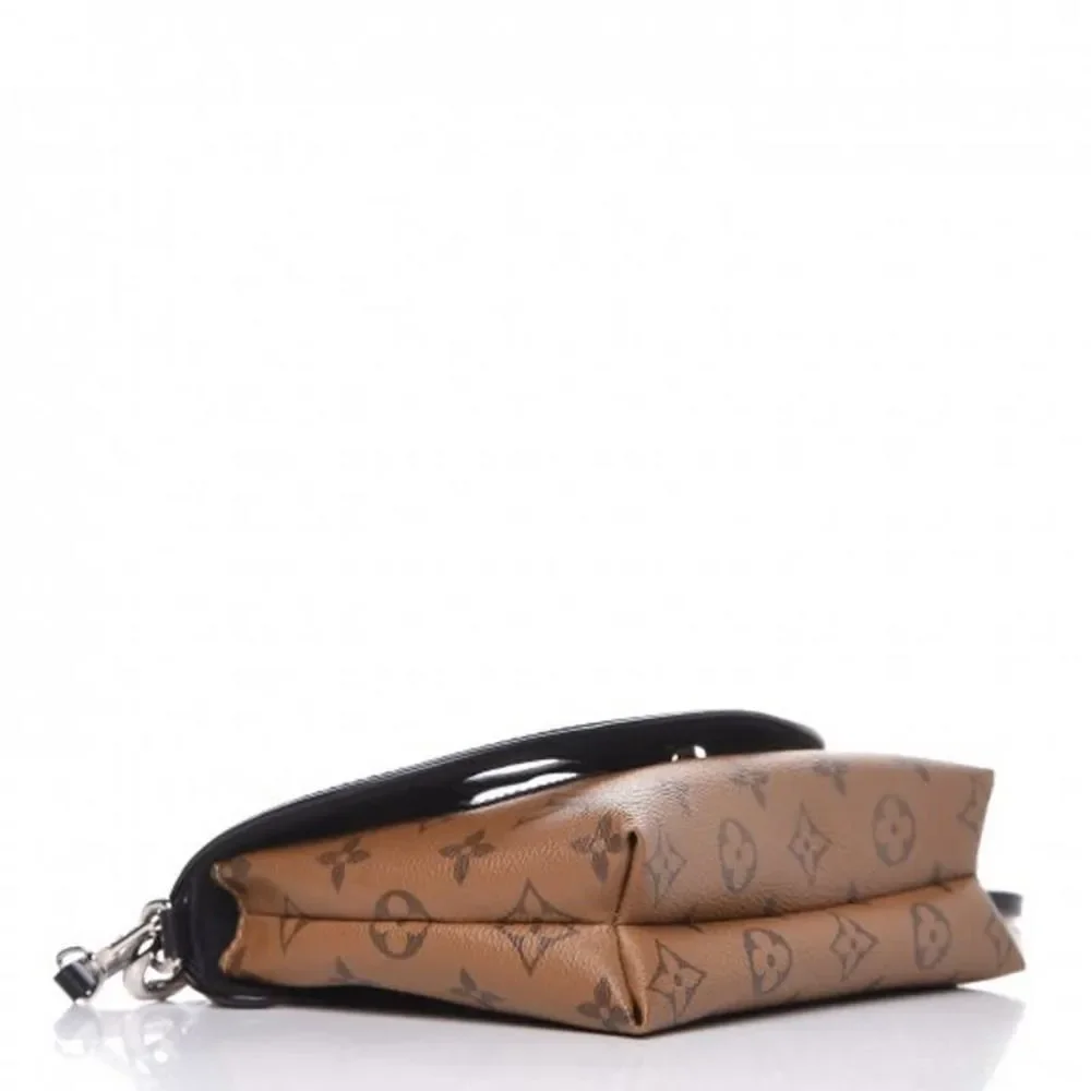 LOUIS VUITTON Reverse Monogram Kabuki Japan Eyes Pochette shoulder bag Pink LV